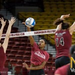 Sr. Whitney Woods smacks the ball for a point