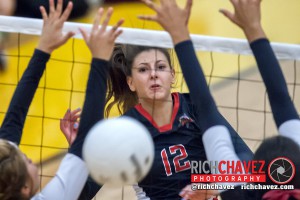 OH Jadyn Nuñez smashes the ball between Gadsden defenders.