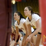 Jennah DeVries (left) and Kelsey Brennan prepare for the serve