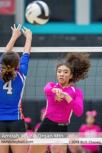 OH Amirah Young rifles the ball past a Las Cruces High School defender.