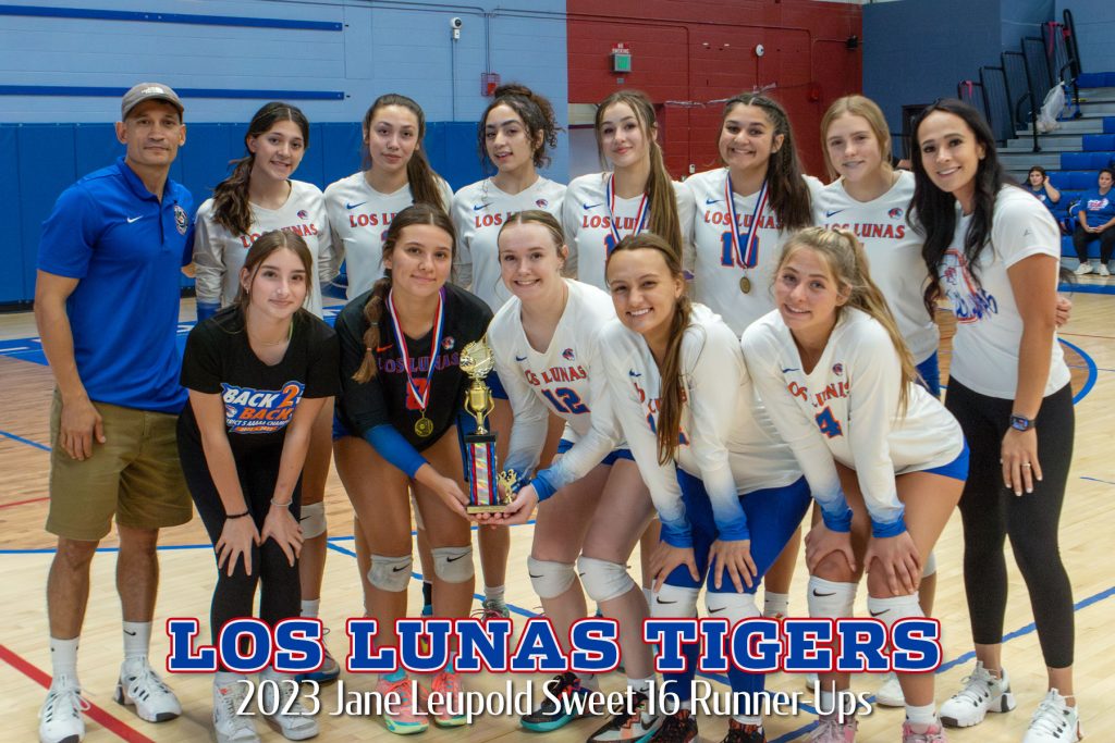 Los Lunas High School Volleyball Team poses with the 2nd Place Trophy from the Sweet 16 Tournament.